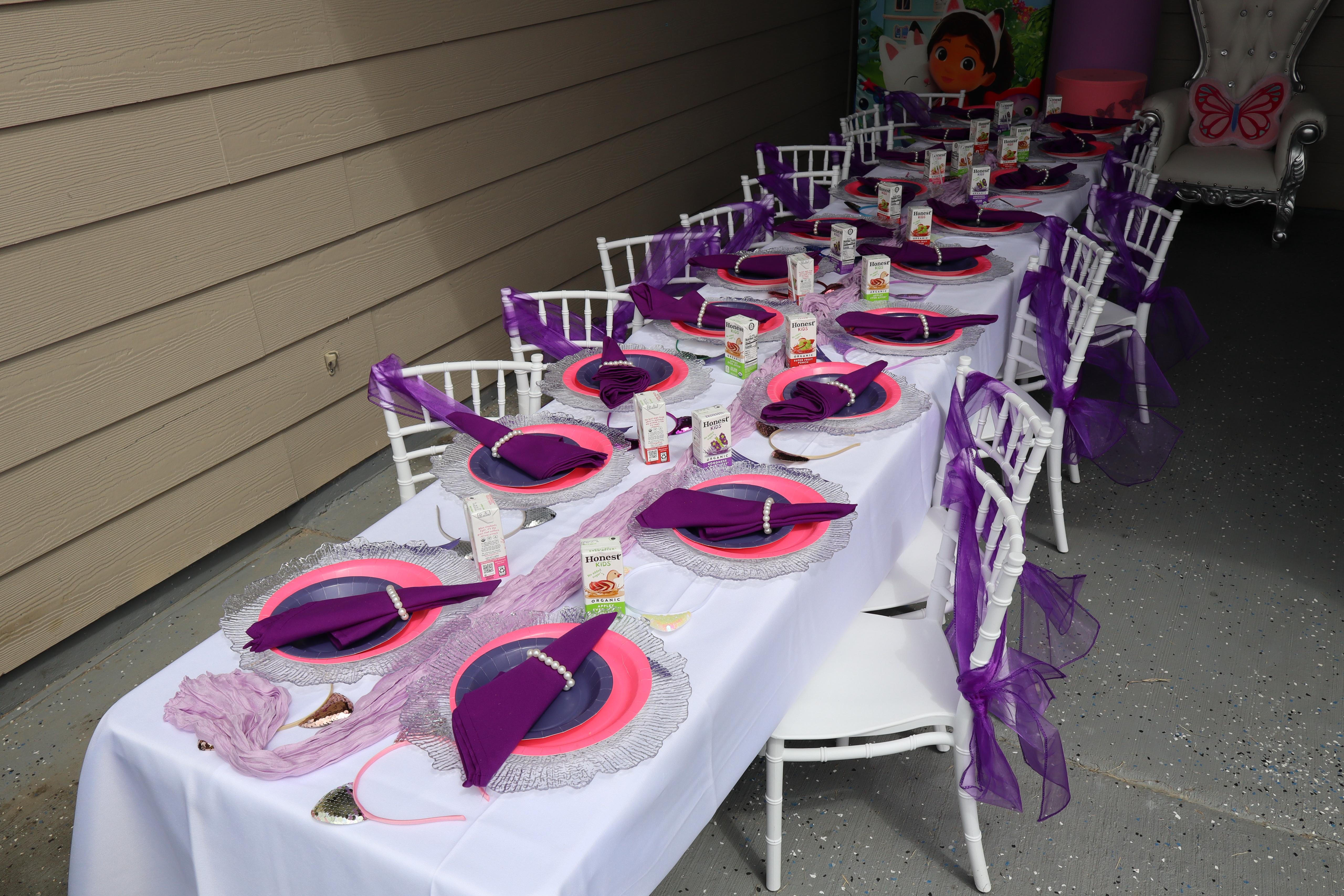 Wide celebration photo featuring a Family Rock Party Rentals event setup.